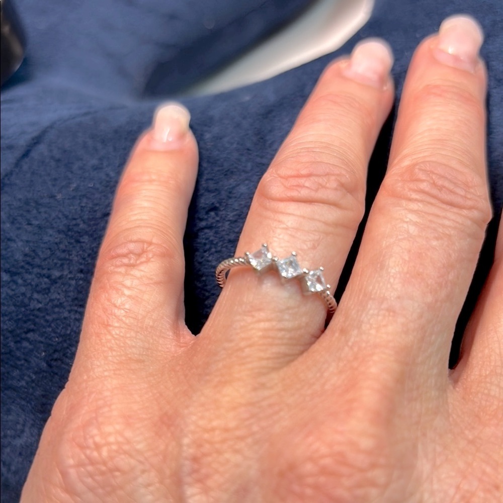 Solid diamond Silver plated over stainless steel Cubic‎ Zirconias Ring.